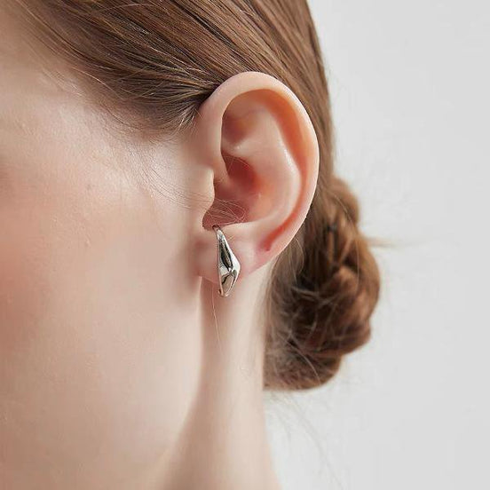 Silver ear cuffs in minimalist fluid design – one pair