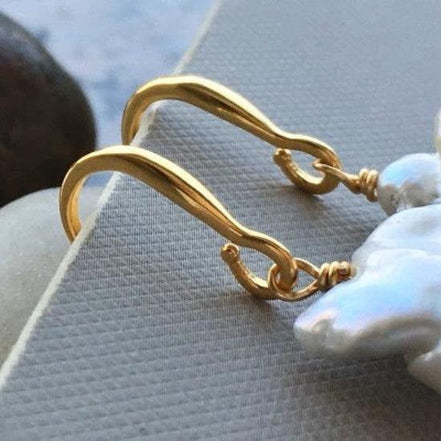 Large drop earrings with large baroque pearls
