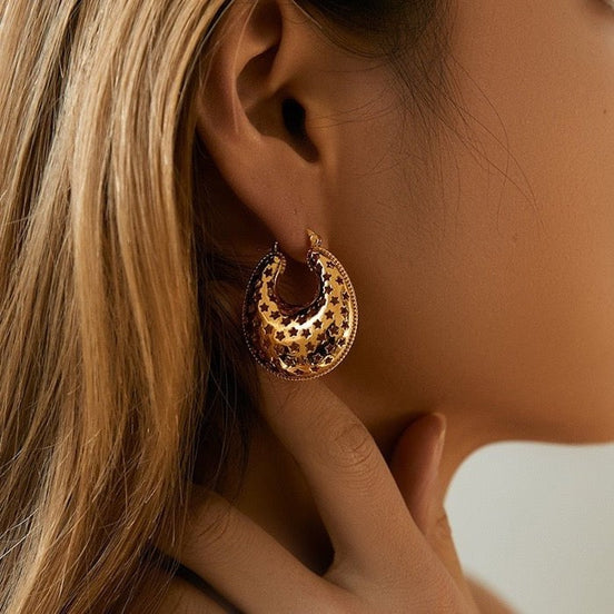 Hollow star pattern earrings