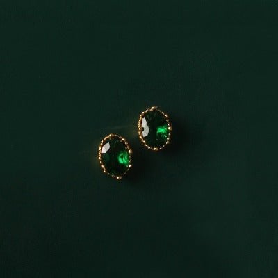 Boucles d'oreilles à tige vintage modernes avec cristal vert