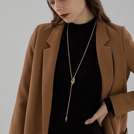 Collier long drapé doré