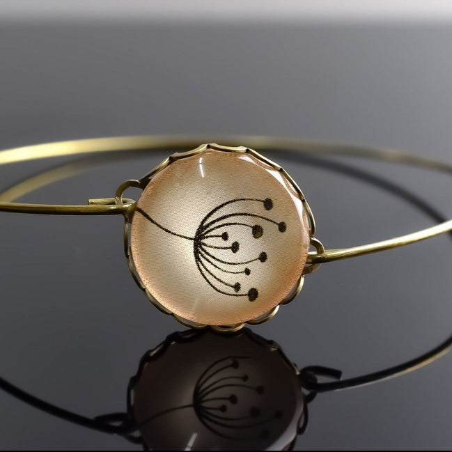 Eleganter Armreif mit Pusteblumen-Glascabochon