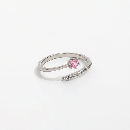 versilberter Edelstahlring, mit Zirkonastein in Krappenfassung und kleinen Zirkoniasteinen