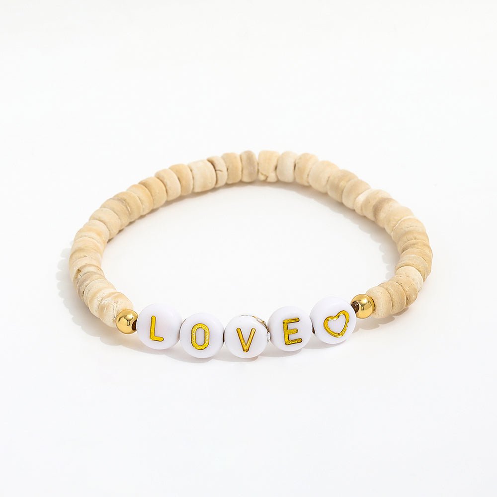 Beigefarbenes Perlenarmband Coco Bahia mit Buchstabenperlen LOVE