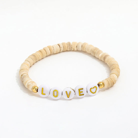 Beigefarbenes Perlenarmband Coco Bahia mit Buchstabenperlen LOVE