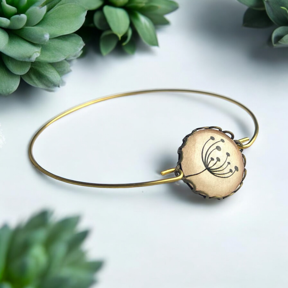 Eleganter Armreif mit Pusteblumen-Glascabochon