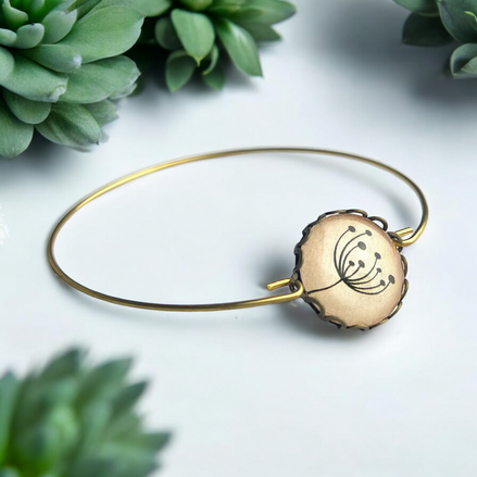 Eleganter Armreif mit Pusteblumen-Glascabochon