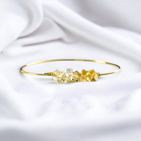 Eleganter Armreif mit Citrinsteinen, vergoldet