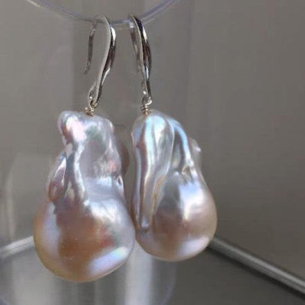 Large drop earrings with large baroque pearls