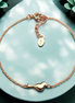 Vergoldetes Armband mit Vogelmotiv