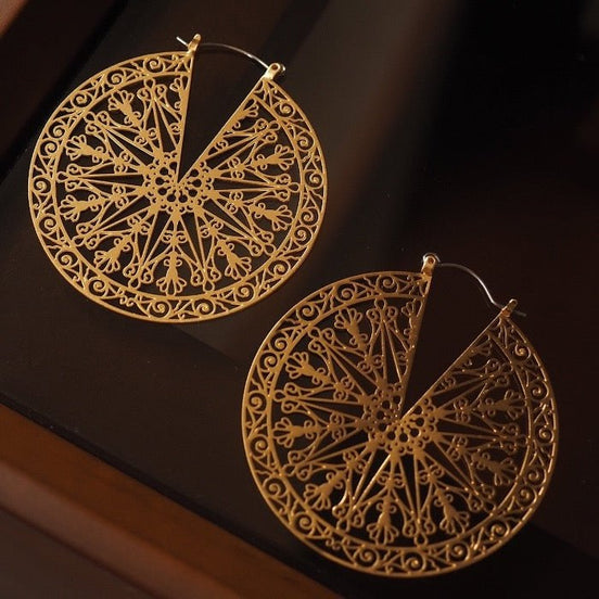Filigree Ferris wheel earrings in Greek style