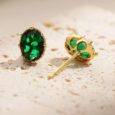 Boucles d'oreilles à tige vintage modernes avec cristal vert