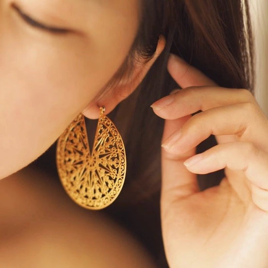 Filigree Ferris wheel earrings in Greek style