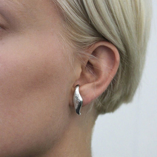 Silver ear cuffs in minimalist fluid design – one pair