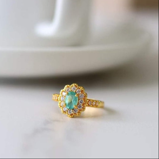 Emerald gemstone flower ring, emerald green